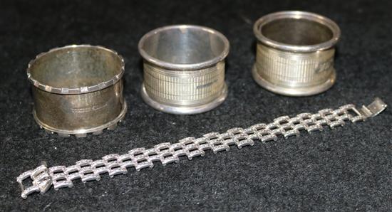 4 silver napkin rings & silver watch strap